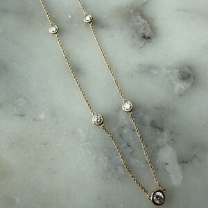 14kt Gold Diamond Station Necklace.